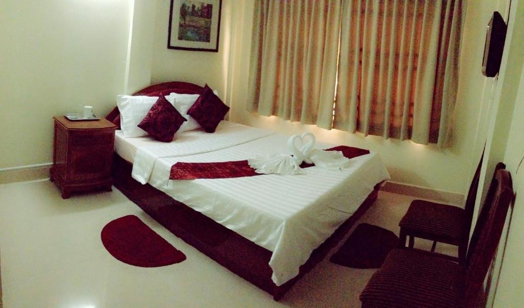 Homeland Guesthouse Phnom Penh Værelse billede