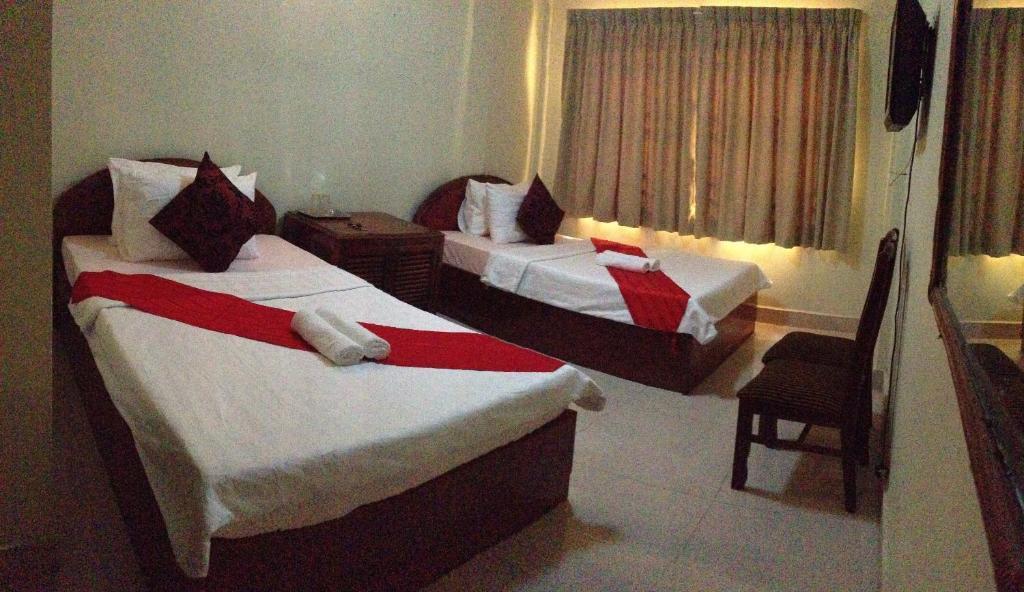 Homeland Guesthouse Phnom Penh Værelse billede