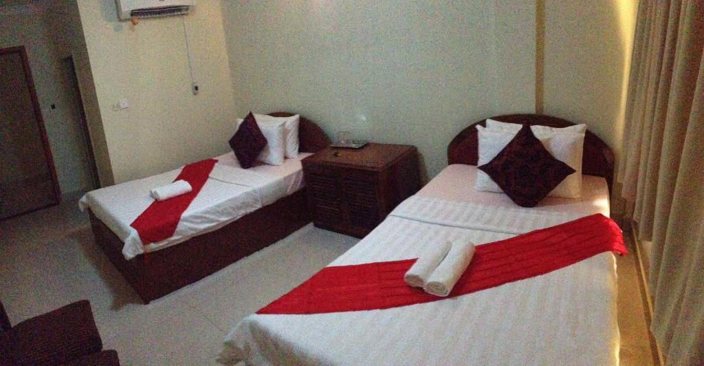 Homeland Guesthouse Phnom Penh Værelse billede
